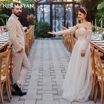 Nersesyan אלגנטי נצנצים שמלות חתונה מחוץ כתף נצנצים שרוול ארוך קו שמלות כלה ללא משענת שמלת כלה נסיכה