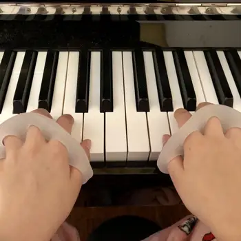 1Pair פסנתר הכשרה כלי שימושי חיי שירות ארוכים חוזק יד מאמן פסנתר אצבע היד הכשרה כלי משחק.