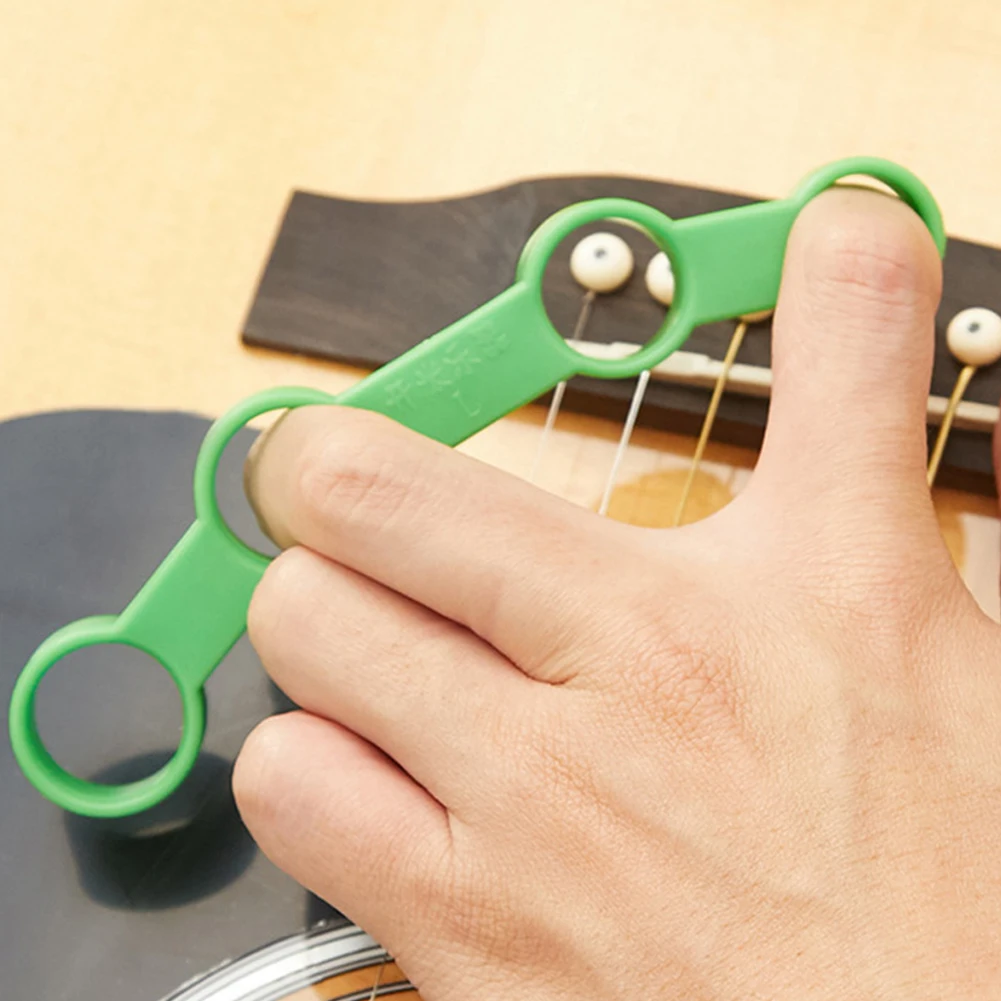 1pc גיטרה האצבע הכשרה Span התרגילים מתח אחיזת היד אלונקה כוח מאמן נגינה ואביזרים מפלסטיק - 4